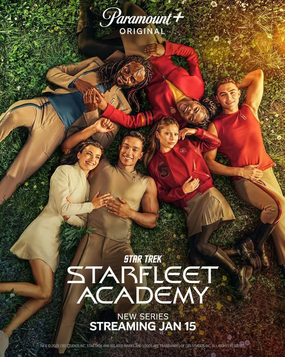 Promotional poster: Along the top of reads "Paramount+ Original". Along the bottom: "Star Trek: Starfleet Academy New series streaming Jan 15". In the image we see six young people, laying in the grass, their bodies just slightly entangled in one another, but also kind of paired off. They're looking up at the sky, smiling and laughing. Maybe they saw a cloud that looks like Professor Tilly. In the top left is a young male Klingon with luxurious, shiny dreadlocks. He's laying his head on the stomach of a woman who appears human, possibly of African descent, with thick, beautiful curls in her hair, laughing uproariously. On the right is a young man, apparently human who looks like he just pledged his favorite sorority. You know the type. His name is probably Brad or Chad. Leaning on his arm is a young woman who is the only one not smiling, but is smirking. She looks like she's maybe ¼ Romulan: southern Romulan. Next to her is a guy who looks like he came straight out of a Calvin Klein ad, possibly of South or Central American descent. Leaning on him, on the left side, is a woman who looks like a young Brooke Shields, like she did in the film The Blue Lagoon.