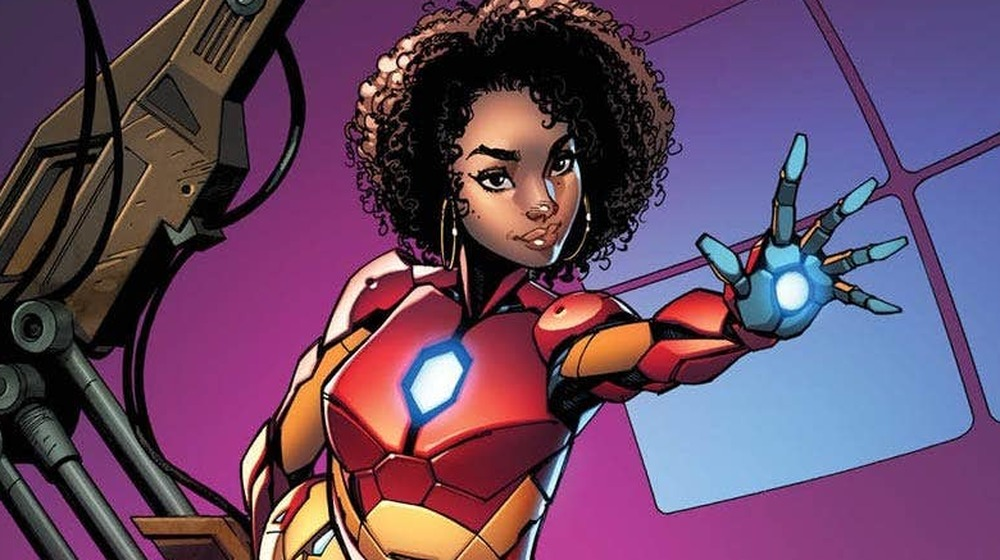 Comic of Marvel's Ironheart. She is a young black woman with curly hair. She is wearing Iron-Man type armor.