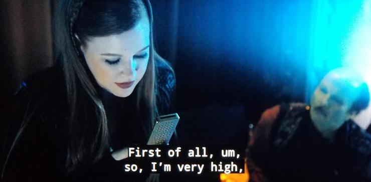 Star Trek Discovery scene. We're on the street w/Tilly and a green alien fella sitting behind her. Green guy looks like Ron Howard's brother who's in all of his movies, and Tilly is half bent over talking into a handheld communicator. Closed caption reads, "First of all, um, so, I'm very high."