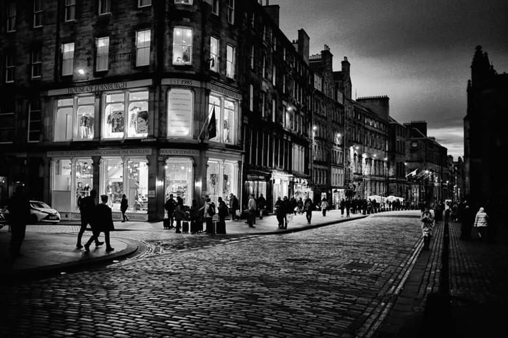 A black and white view down the High Street near St. Giles