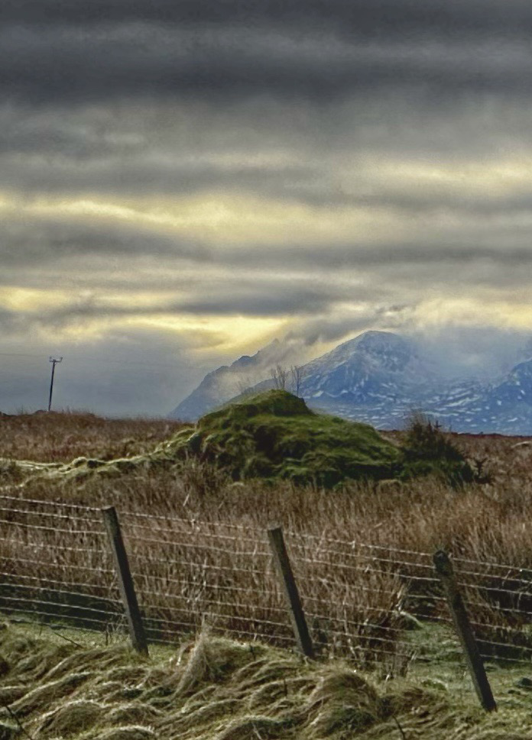 “Sunshine is delicious, rain is refreshing, wind braces us up, snow is exhilarating; there is really no such thing as bad weather, only different kinds of good weather.” John Ruskin.  The Cuillins in the stormy distance viewed across the miles from a calm viewpoint. 